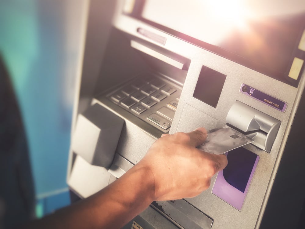 How To Avoid ATM Fees And Fraud