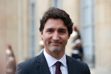 Canadian prime minister Justin Trudeau posing in a formal suit