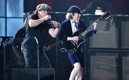 ACDC playing live on stage at the grammys while using a teleprompter