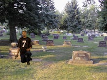 A photoshop image with a racist image of a man of a graveyard