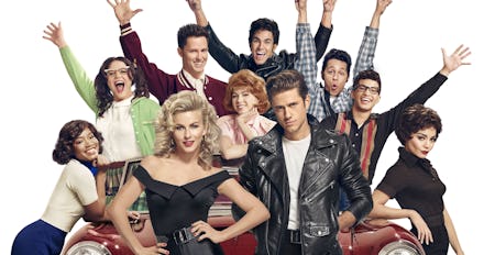 The broadway cast of grease posing for a promotional photo