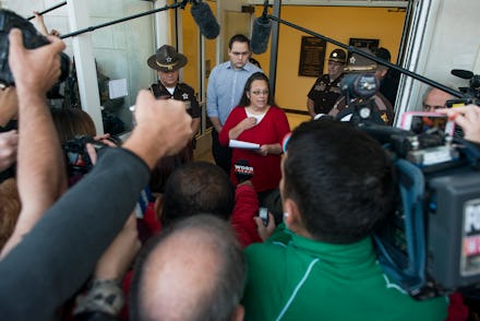 Kim Davis talking with journalists