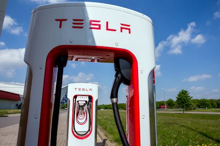 Two Tesla car charging stations on a road