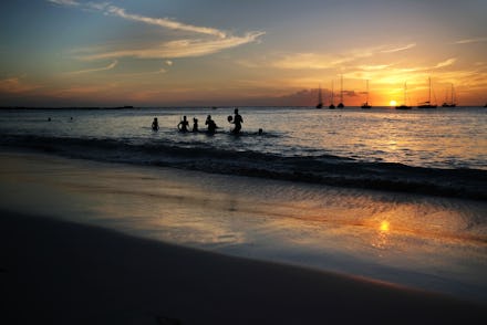 Tourists swimming on the island in the northern Caribbean after the hurricanes.