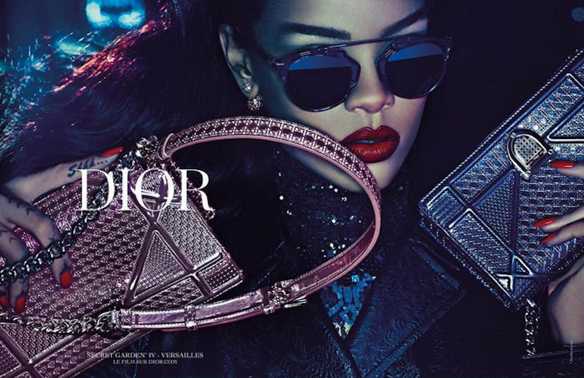 Rihanna's Latest Fashion Ad for dior with her holding two purses while wearing sunglasses