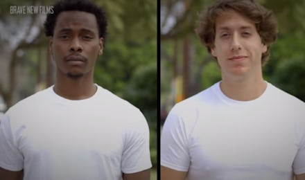 A white and black man standing next to each other in identical white shirts