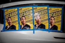 Posters that call people to vote for Alexandria Ocasio-Cortez