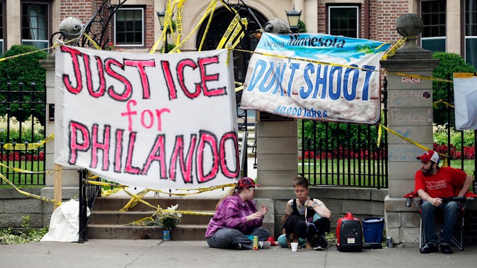 Protest banner with "Justice for Philando" text on the street