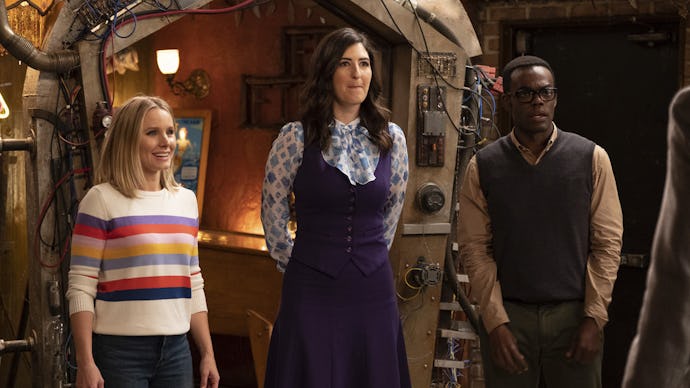 Eleanor, Chidi and Janet standing next to each other in an episode of the good place
