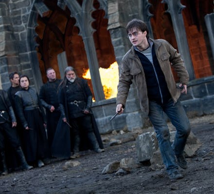 Harry Potter battling Lord Voldemort in the ruins of Hogwarts