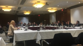 A group of people attending a meeting with campaign officials