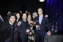 The cast of big bang theory posing with their emmys