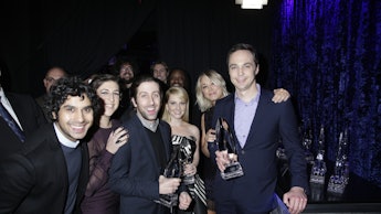 The cast of big bang theory posing with their emmys