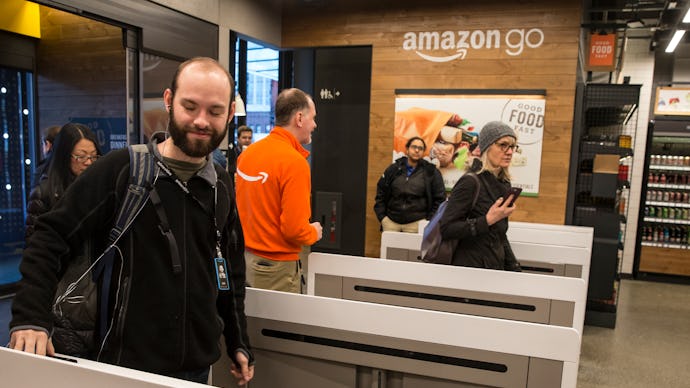 People walking around at a cashless Amazon Go store 