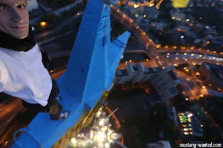 A Ukrainian Stuntman taking a selfie on a skyscraper in Russia