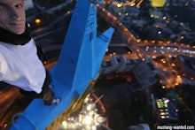 A Ukrainian Stuntman taking a selfie on a skyscraper in Russia