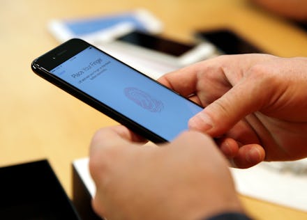 A man holding an iPhone