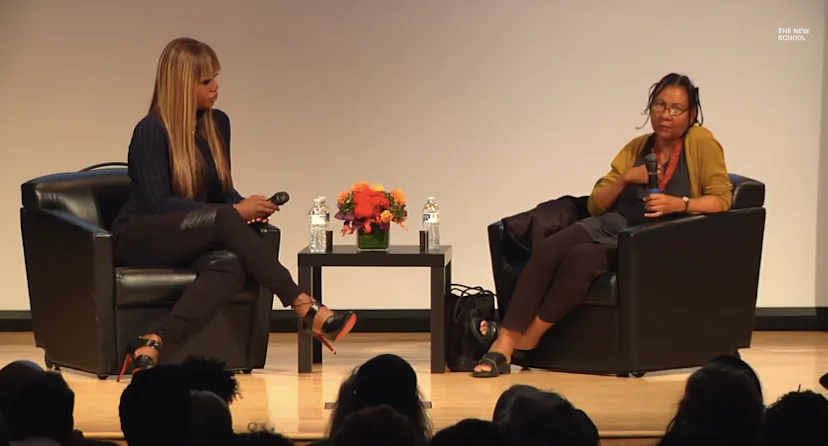 Women engaging in thoughtful feminist dialogue