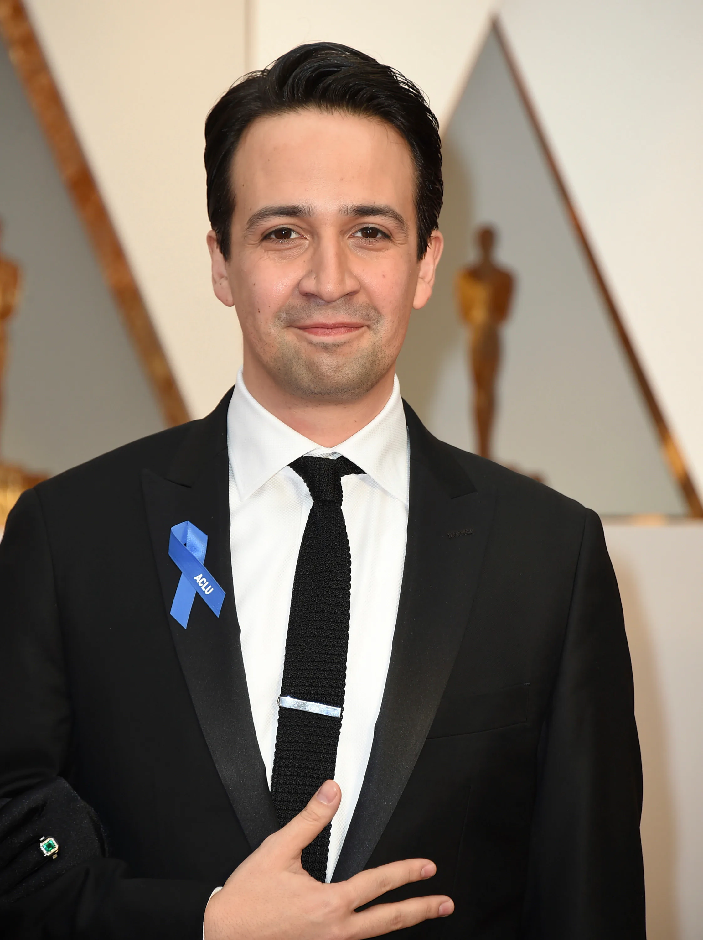 What does the Oscars blue ribbon mean? Here's the subtle way stars are ...