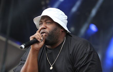 Killer Mike performing live in a white bucket hat and black shirt