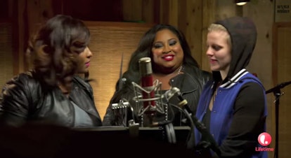 Three women in studio during a radio show