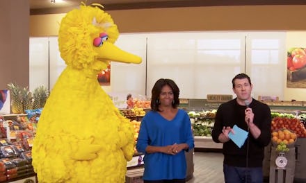 A scene with Big Bird, Michelle Obama, and Billy Eichner in a supermarket