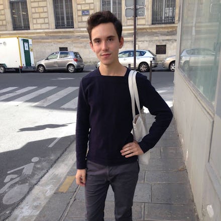 The student that experienced the Paris Attack posing for a photo on a Paris street