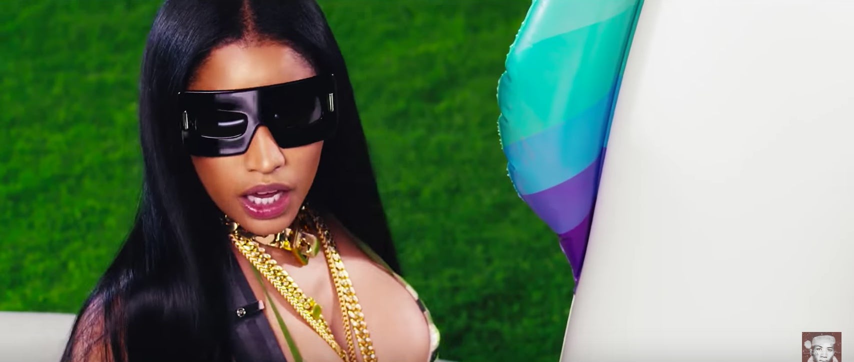 Nicki Minaj rides an inflatable unicorn in 