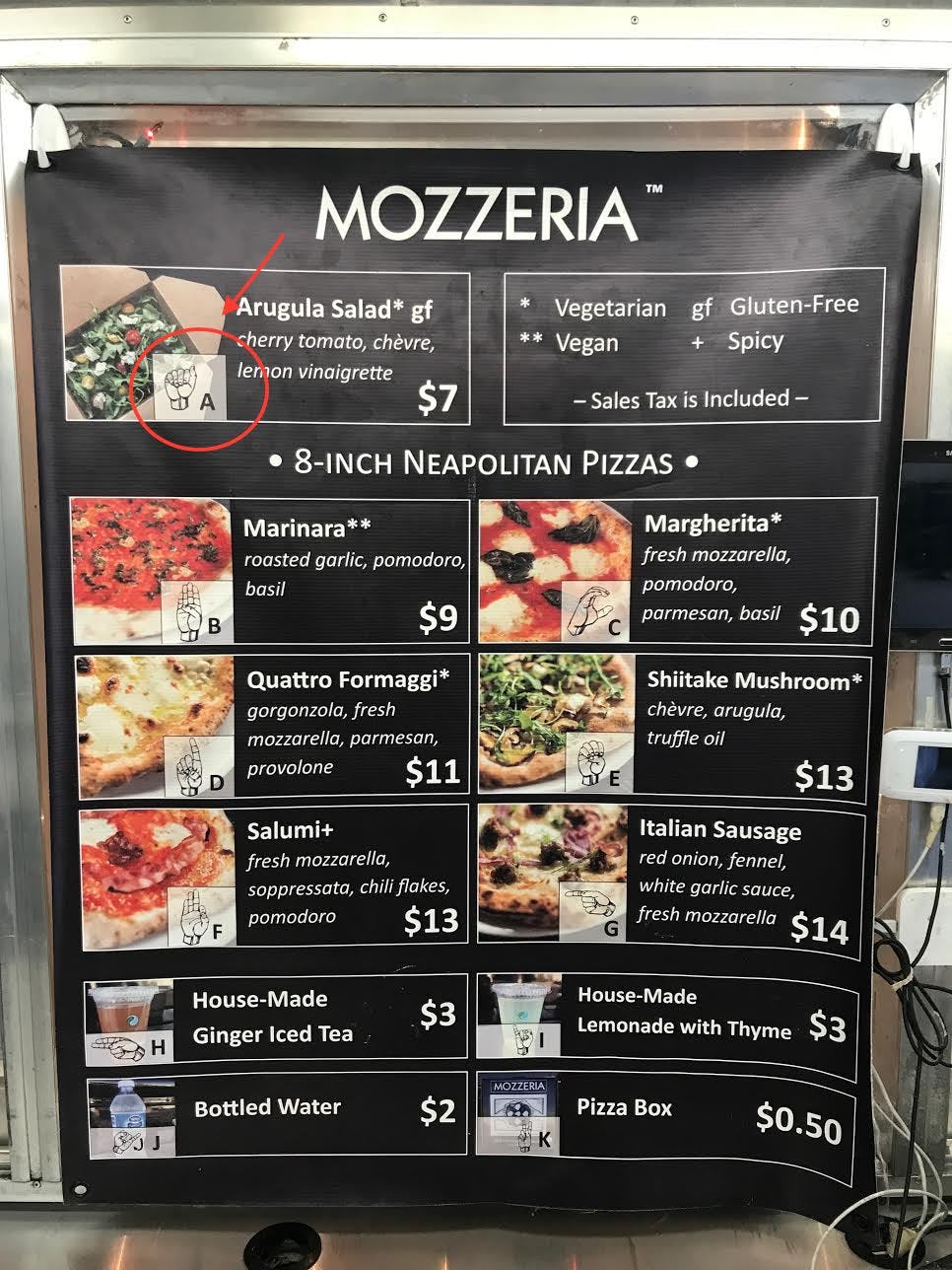 This pizza shop is run entirely by deaf people — and the world is