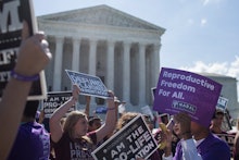People protesting in front of the US Supreme Court against states aiming to ban abortion