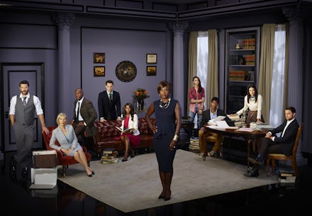How to Get Away With Murder cast gathered around the living room set in the show