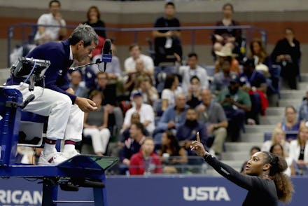 Serena Williams speaking to a judge during a match