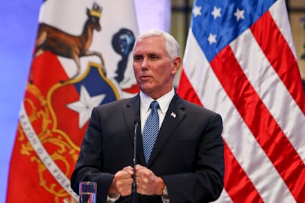Vice President Mike Pence, giving a speech in front of the flag of the U.S.A