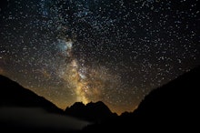 The Milky Way and a falling star in the night sky