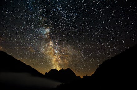 The Milky Way and a falling star in the night sky