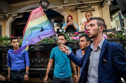 Demonstrants at the Istanbul LGBT Pride waving with flags