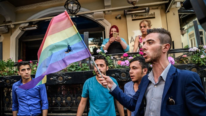 Demonstrants at the Istanbul LGBT Pride waving with flags