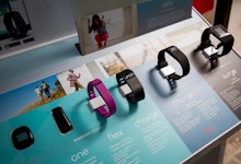 A display with smartwatches by Fitbit in a store and the monitoring isn't as accurate as you think