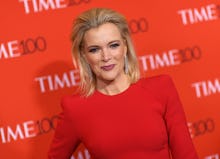 Megyn Kelly posing in a red dress