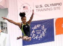 Laurie Hernandez in the air during practice 