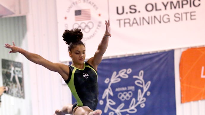 Laurie Hernandez in the air during practice 