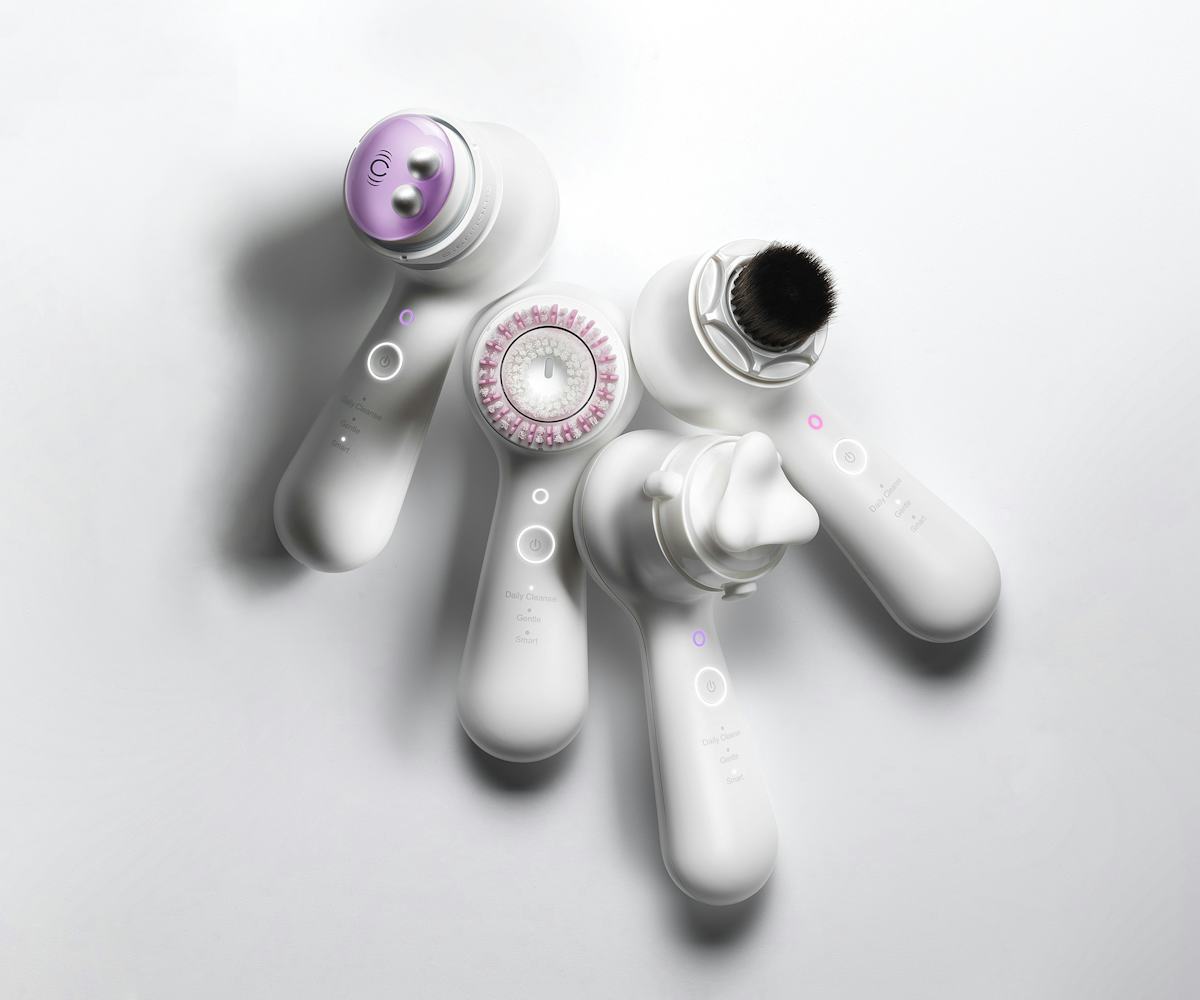 Clarisonic’s famous face cleansers and massagers laid down on a white background