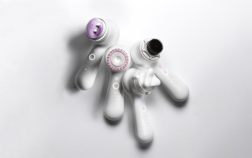 Clarisonic’s famous face cleansers and massagers laid down on a white background