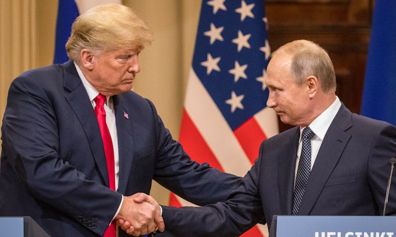 Trump and Putin shaking hands on a conference in Helsinki