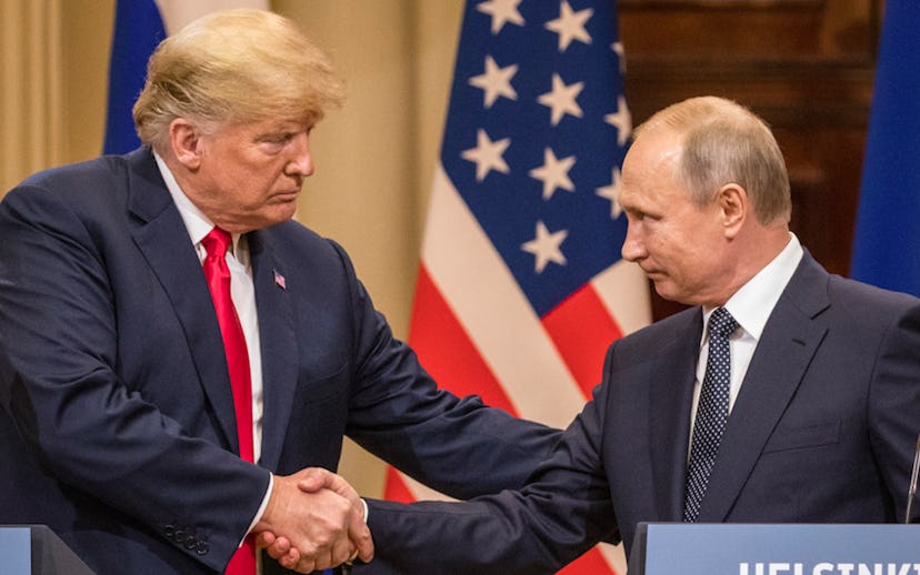 Trump and Putin shaking hands on a conference in Helsinki