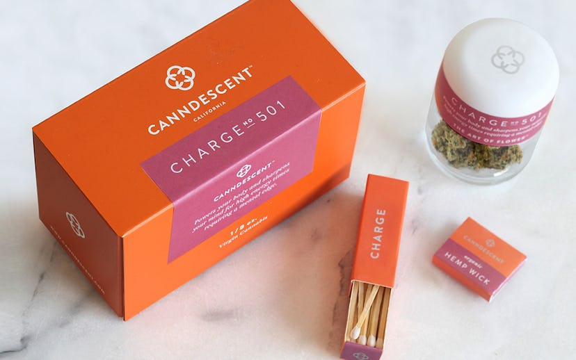 Canndescent cannabis from the "Charge" line packaged in orange and burgundy boxes