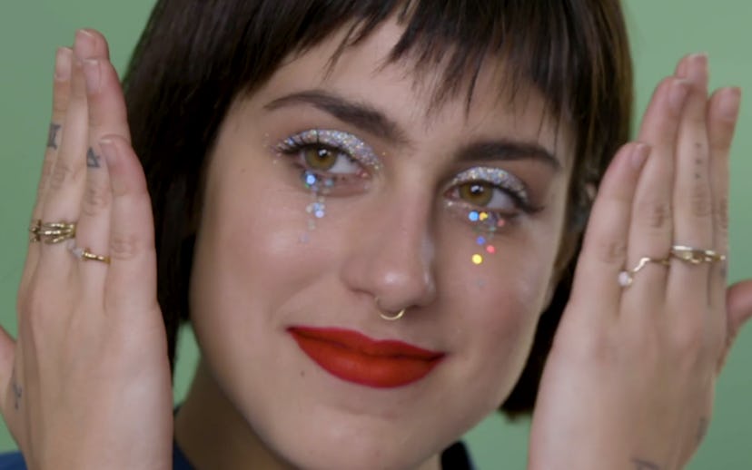 Makeup artist Clara Rae showing her perfect glittery makeup look