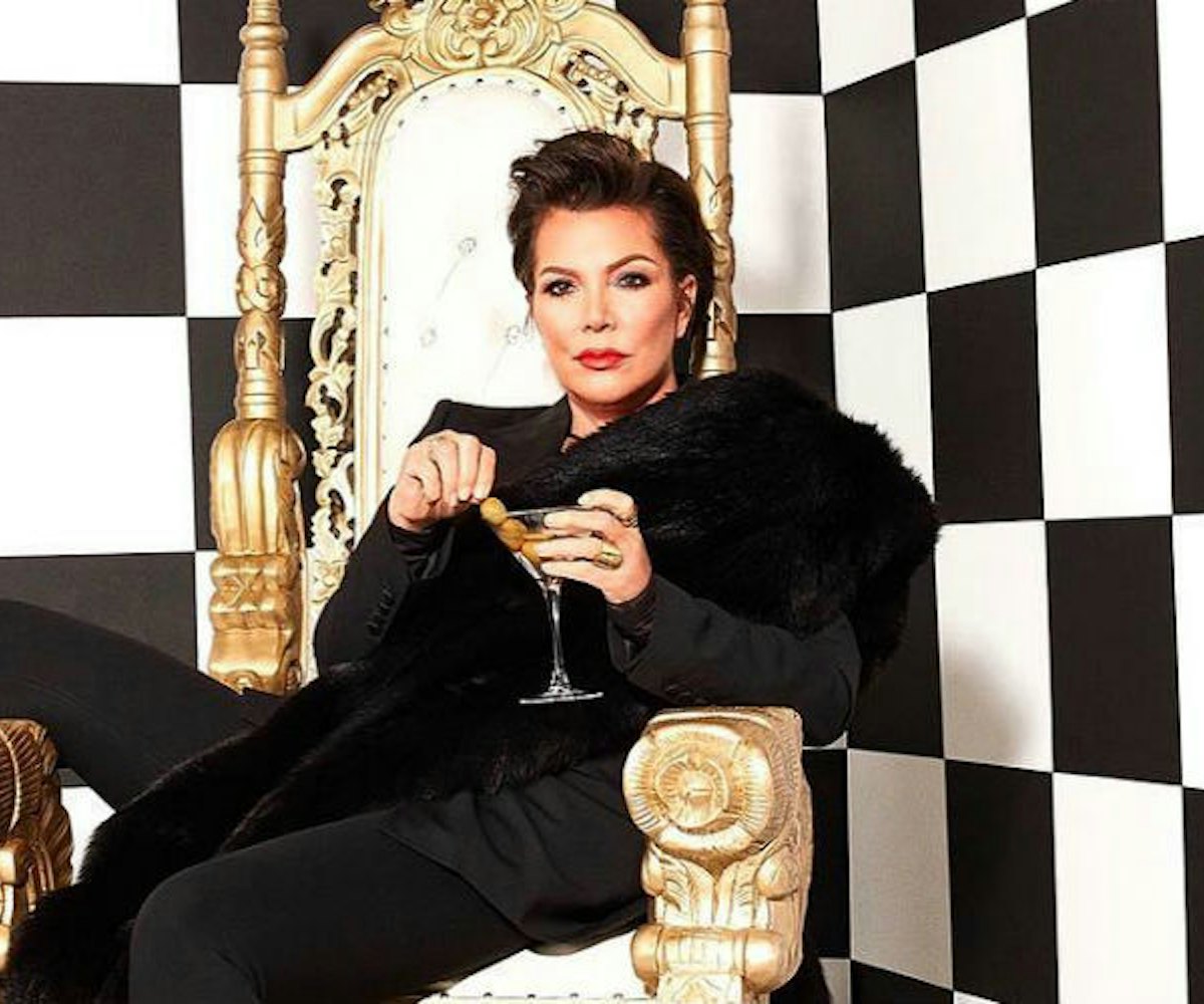 Kris Jenner, mother of famous Kardashian and Jenner sisters, sitting on a throne in a black and whit...