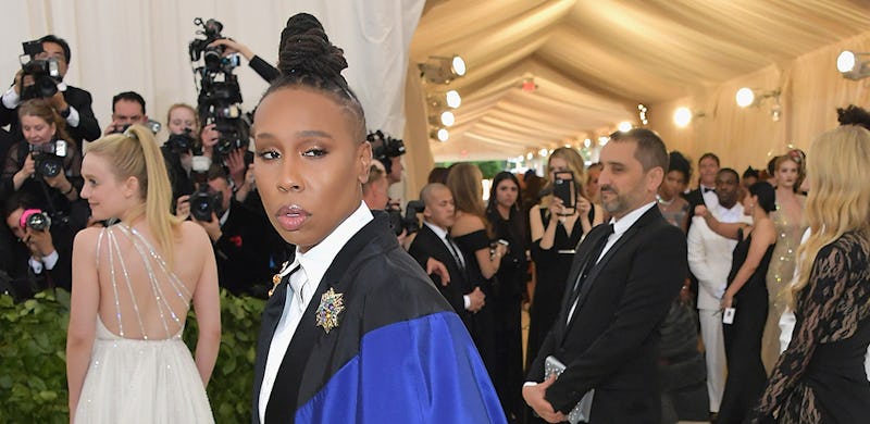 Lena Waithe in a white button-up and a cape at the 2018 Met Gala