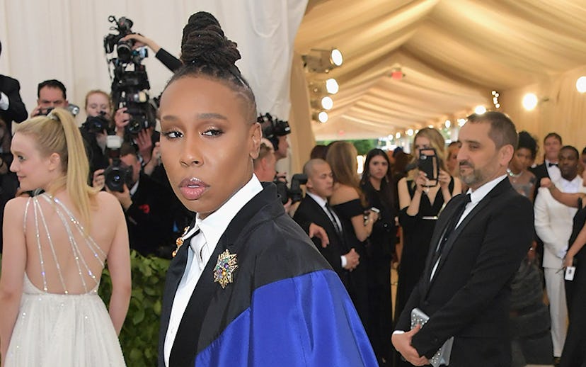 Lena Waithe in a white button-up and a cape at the 2018 Met Gala
